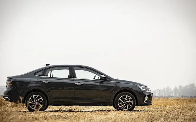 Volkswagen Virtus side profile on the road emphasizing sporty stance