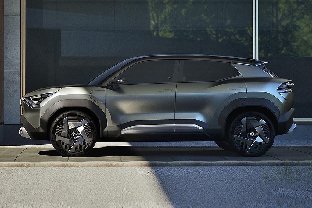 Maruti Suzuki EVX side view highlighting sporty 19-inch alloy wheels and aerodynamic profile