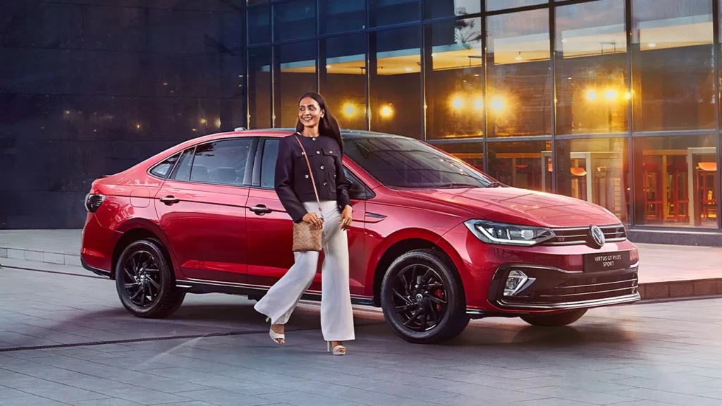 Volkswagen Virtus sedan side view in metallic blue, highlighting sleek body lines and premium alloy wheels with Diwali discounts tag